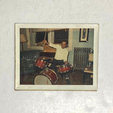 Photograph of African-American man playing drums