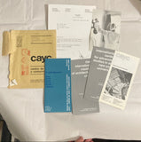 Centro de Arte y Comunicacion - Short signed note from Jorge Glusberg to Eleanor Kent, Alberto Heredia postcard, 3 CAYC pamphlets, 1 CAYC exhibition catalog with original mailing envelope (1980-81)