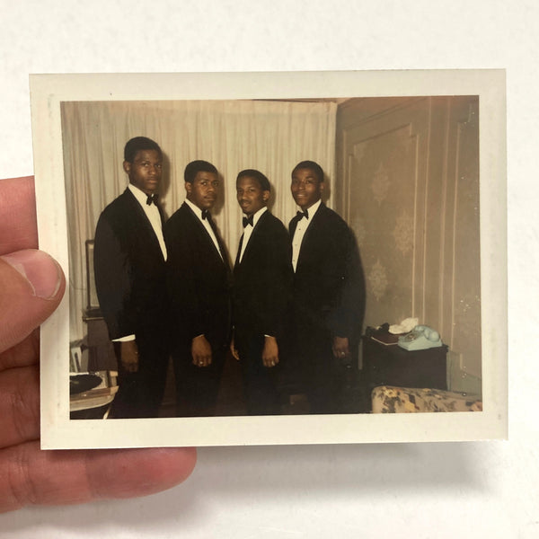 Photograph of Four African-American Young Men in suits, perhaps graduating from High School or College